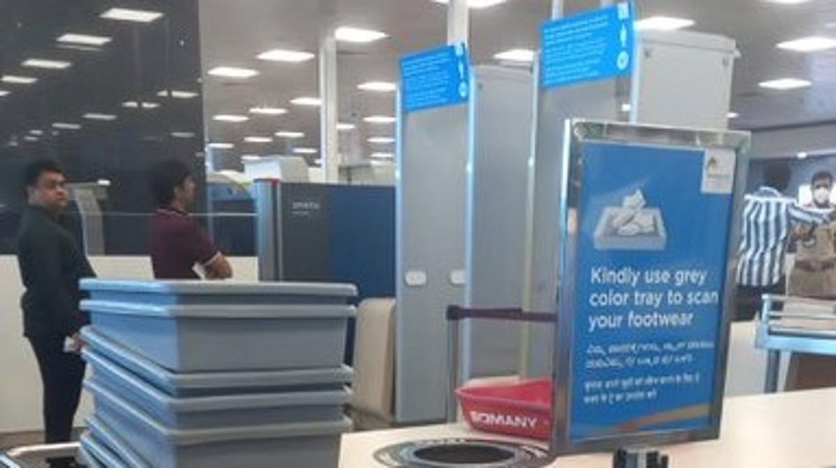 Ahmedabad Airport lost and found help desk assisting passengers with misplaced items