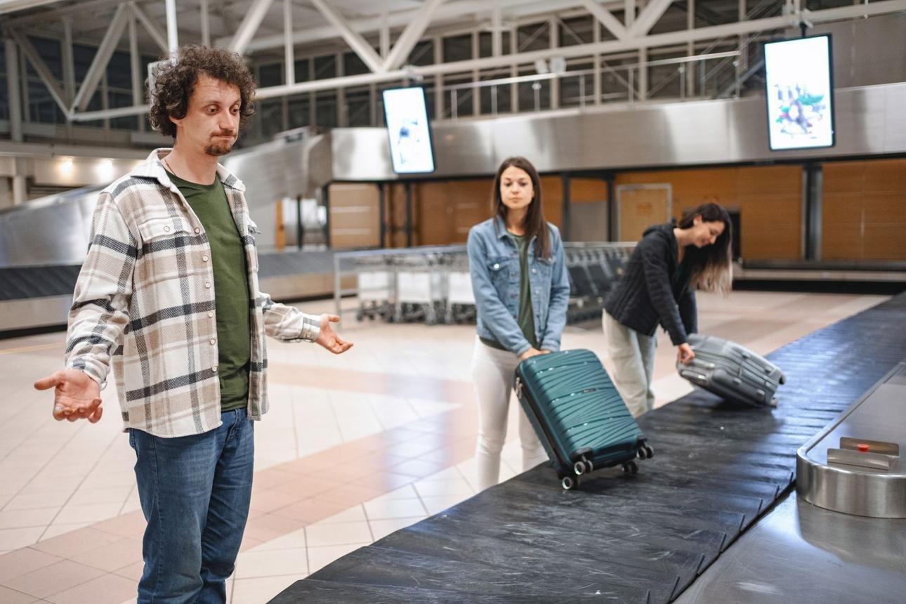 Traveler searching for lost luggage and personal items at airport