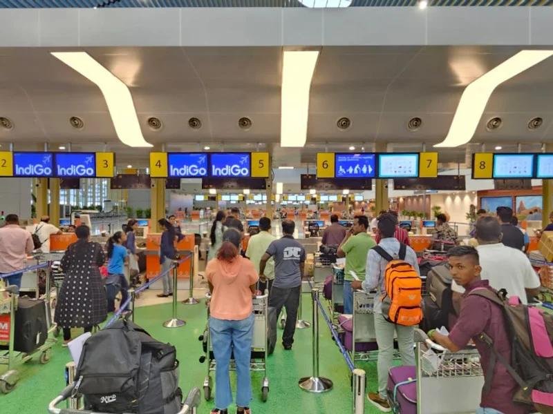 Chennai Airport terminal or passenger checking luggage at airport