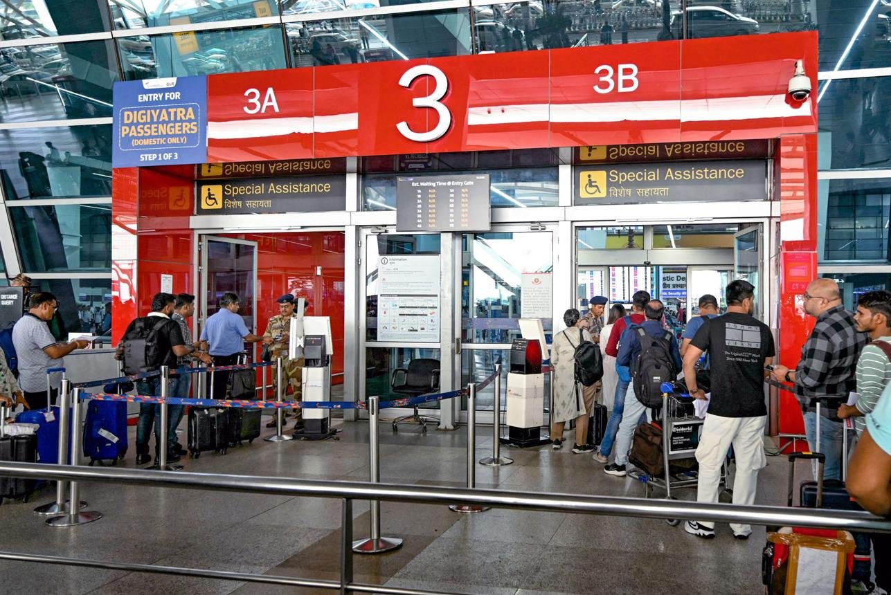 CISF personnel assisting passengers with lost and found items at an Indian airport